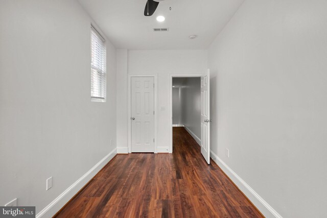 66 O St NW, Washington, DC 20001 - corridor with baseboards, dark wood-type flooring, and visible vents