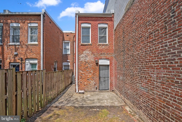 66 O St NW, Washington, DC 20001 - back of property featuring fence and brick siding