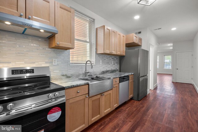66 O St NW, Washington, DC 20001 - kitchen with appliances with stainless steel finishes, light brown cabinets, extractor fan, dark wood finished floors, and visible vents