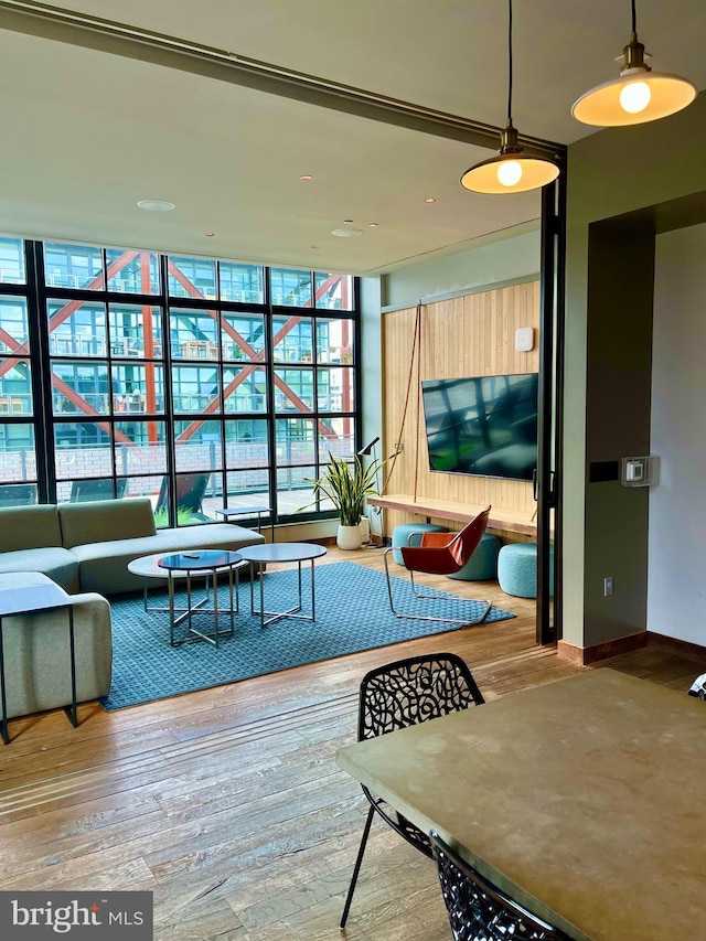 2030 8th St NW Unit Ph-5, Washington, DC 20001 - living area with expansive windows, wood finished floors, and baseboards