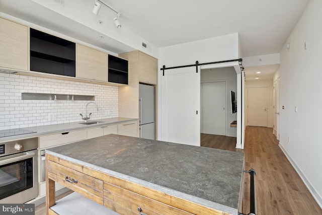 2030 8th St NW Unit Ph-5, Washington, DC 20001 - kitchen with stainless steel oven, open shelves, refrigerator, modern cabinets, and a sink