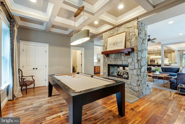 7312 Gordons Rd, Falls Church, VA 22043 - recreation room with ornamental molding, light wood-style floors, beamed ceiling, pool table, and a stone fireplace