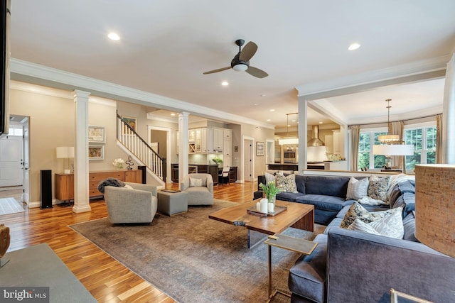 7312 Gordons Rd, Falls Church, VA 22043 - living area with a ceiling fan, ornamental molding, ornate columns, light wood finished floors, and recessed lighting