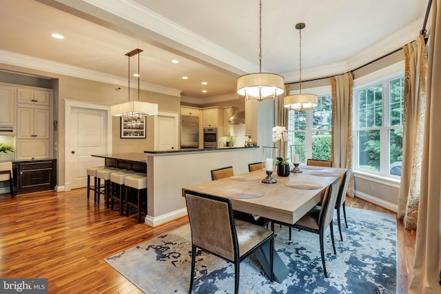 7312 Gordons Rd, Falls Church, VA 22043 - dining room featuring light wood-style flooring, crown molding, recessed lighting, baseboards, and a chandelier