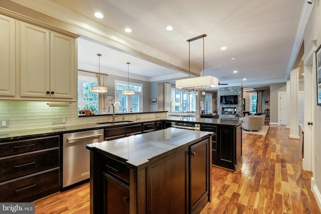 7312 Gordons Rd, Falls Church, VA 22043 - kitchen featuring stainless steel dishwasher, a sink, a chandelier, open floor plan, and a center island