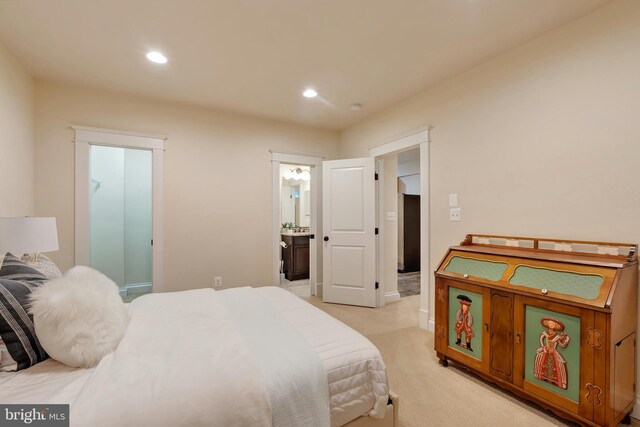 7312 Gordons Rd, Falls Church, VA 22043 - bedroom with light colored carpet, recessed lighting, connected bathroom, and baseboards