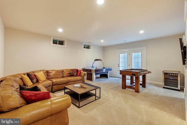 7312 Gordons Rd, Falls Church, VA 22043 - living room with beverage cooler, recessed lighting, light colored carpet, and baseboards