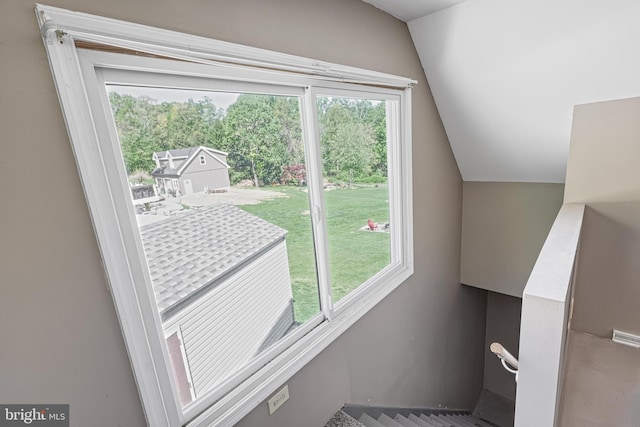 interior space featuring vaulted ceiling