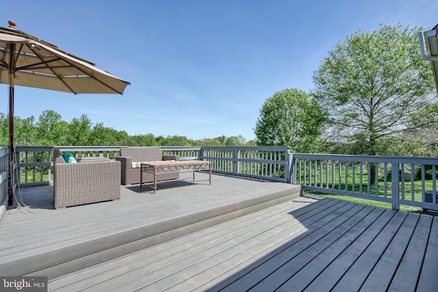 deck with an outdoor living space
