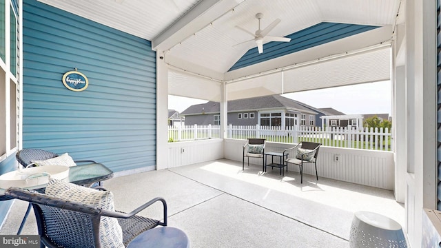 sunroom / solarium with ceiling fan