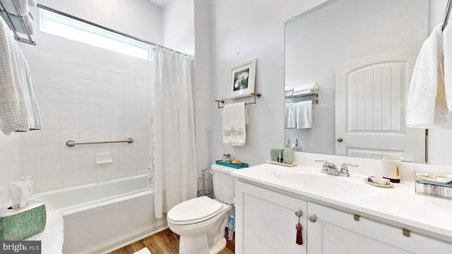 full bathroom with toilet, vanity, shower / bath combination with curtain, and wood finished floors