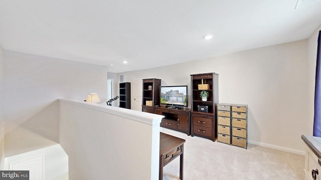 interior space with light colored carpet and recessed lighting