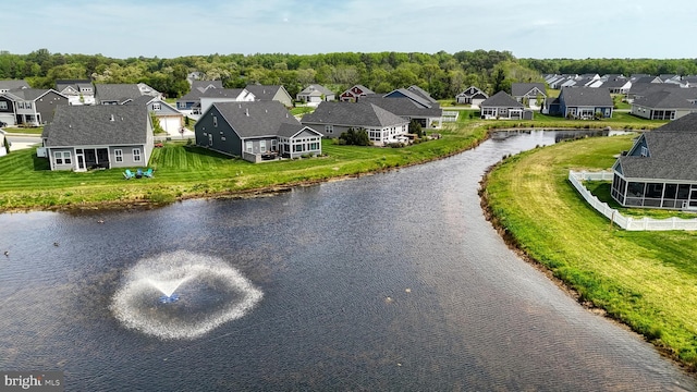 aerial view with a water view and a residential view