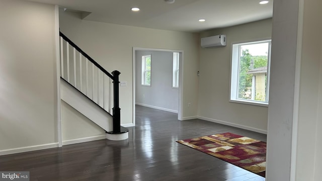 123 Cumberland St, Cumberland, MD 21502 - foyer entrance featuring baseboards, recessed lighting, stairs, and a wall mounted AC