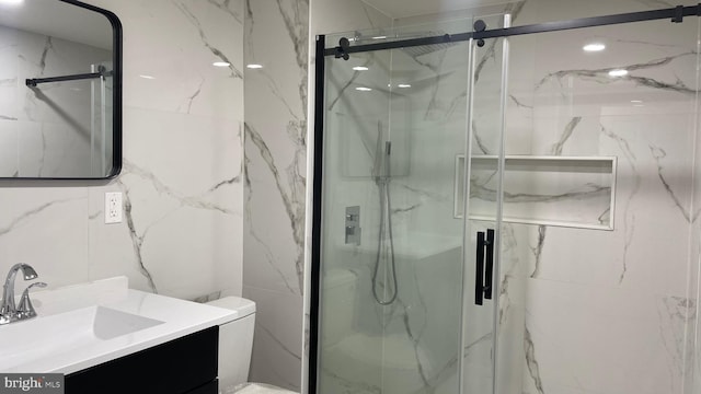 123 Cumberland St, Cumberland, MD 21502 - full bath with vanity, a marble finish shower, and toilet