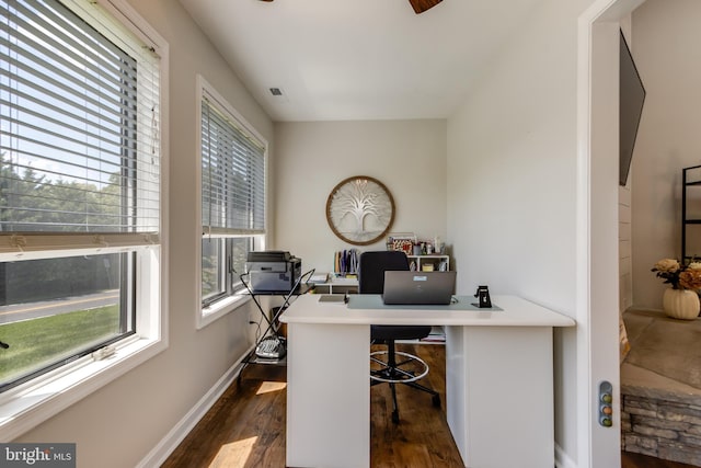 office space featuring baseboards and dark wood-style floors