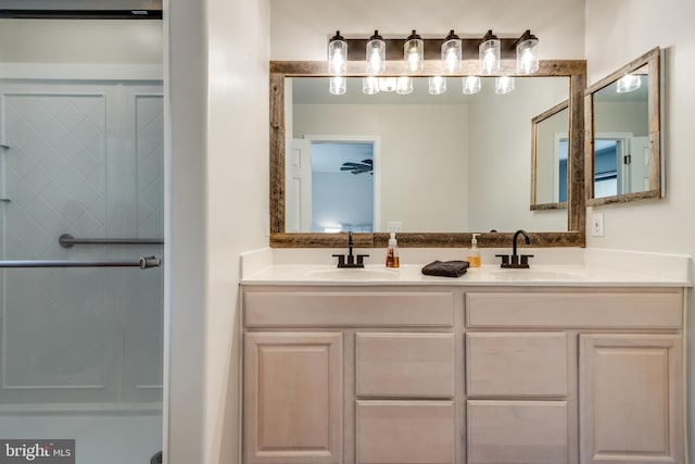 full bath featuring a sink and double vanity