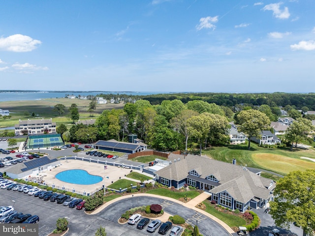 birds eye view of property featuring a water view