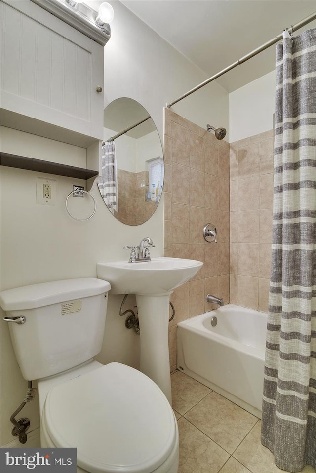 bathroom with tile patterned flooring, toilet, and shower / bathtub combination with curtain