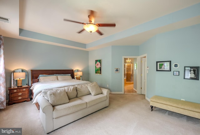 712 Pearson Point Pl, Annapolis, MD 21401 - bedroom with carpet, baseboards, a raised ceiling, ensuite bathroom, and ceiling fan