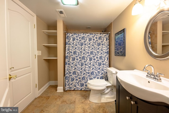 712 Pearson Point Pl, Annapolis, MD 21401 - bathroom with vanity, toilet, and curtained shower