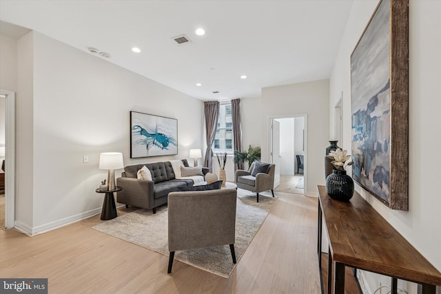 1600 Arch St Unit 1706, Philadelphia, PA 19103 - living room with baseboards, light wood-type flooring, visible vents, and recessed lighting