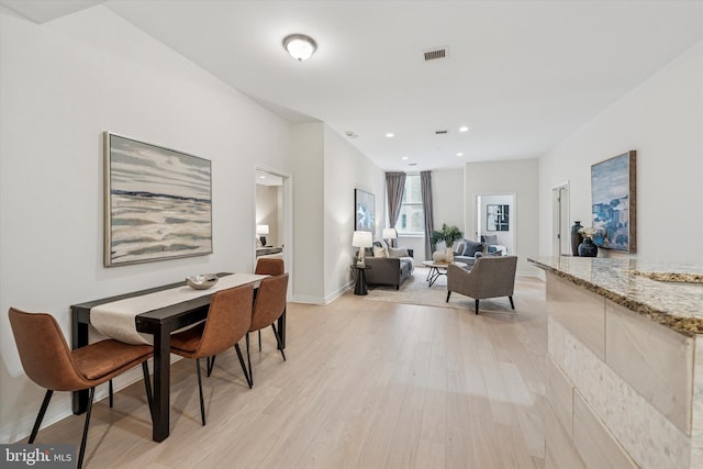 1600 Arch St Unit 1706, Philadelphia, PA 19103 - dining room with light wood-type flooring, recessed lighting, baseboards, and visible vents
