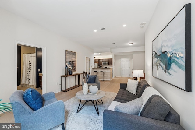 1600 Arch St Unit 1706, Philadelphia, PA 19103 - living room featuring light wood-style floors, baseboards, and recessed lighting