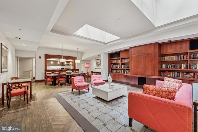 1600 Arch St Unit 1706, Philadelphia, PA 19103 - living room with a skylight, baseboards, and recessed lighting