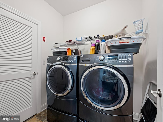 clothes washing area with laundry area and washing machine and dryer