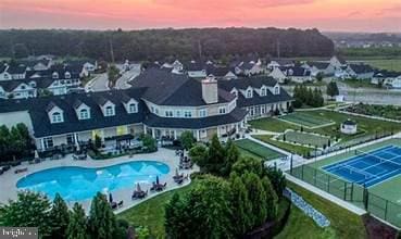aerial view at dusk with a residential view