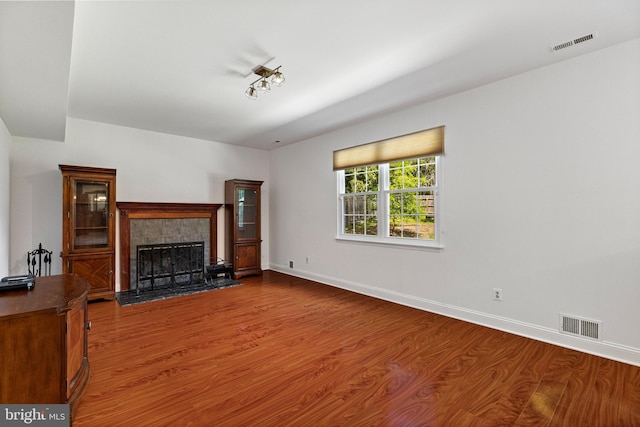 4 Honeysuckle Dr, Robbinsville, NJ 08691 - unfurnished living room featuring wood finished floors, a fireplace, and baseboards