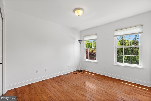 4 Honeysuckle Dr, Robbinsville, NJ 08691 - spare room with light wood-type flooring and baseboards