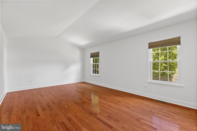 4 Honeysuckle Dr, Robbinsville, NJ 08691 - unfurnished room with wood finished floors, vaulted ceiling, and baseboards