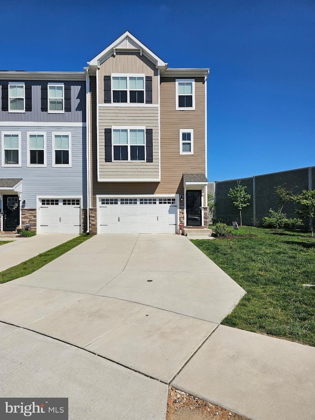 7241 Martin Farm Cir, Baltimore, MD 21237 - view of front of home featuring driveway, stone siding, an attached garage, board and batten siding, and a front lawn
