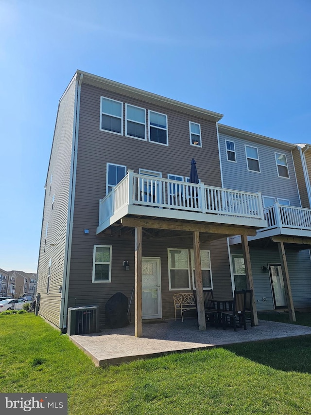 7241 Martin Farm Cir, Baltimore, MD 21237 - back of house featuring a yard, central AC unit, a patio area, and a deck
