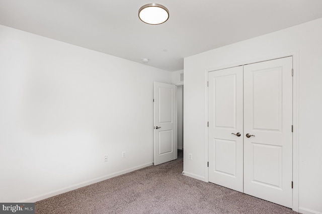 7241 Martin Farm Cir, Baltimore, MD 21237 - unfurnished bedroom with carpet, baseboards, and a closet