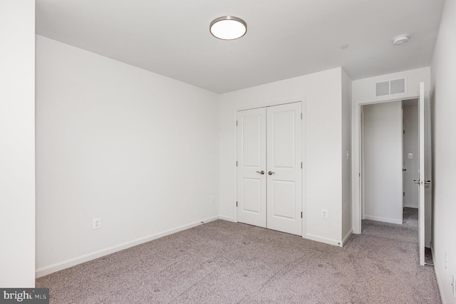 7241 Martin Farm Cir, Baltimore, MD 21237 - unfurnished bedroom with carpet, a closet, and baseboards