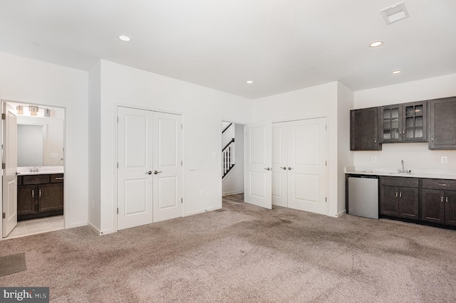 7241 Martin Farm Cir, Baltimore, MD 21237 - interior space with light carpet, recessed lighting, baseboards, wet bar, and stairs