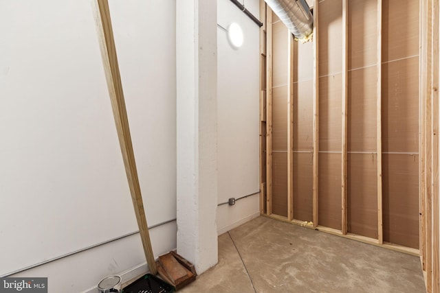 bathroom with concrete flooring