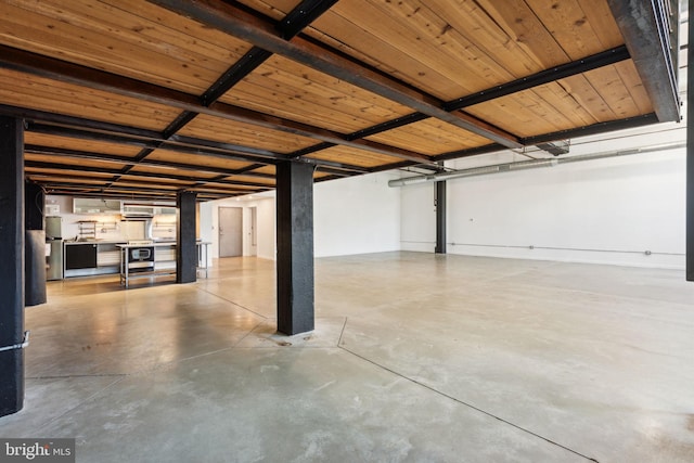 garage featuring a wall mounted air conditioner