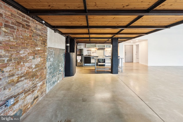basement with brick wall, water heater, and wood ceiling