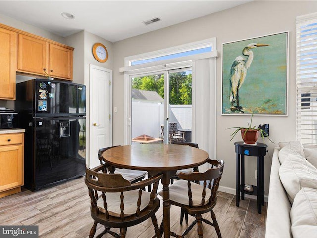 314 Schooner Ln, Berlin, MD 21811 - dining room featuring light wood-style flooring and baseboards