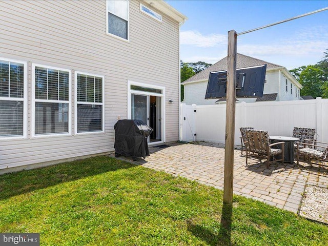 314 Schooner Ln, Berlin, MD 21811 - rear view of property with a patio