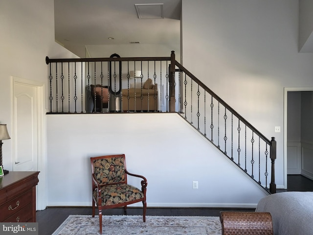 stairs with wood finished floors
