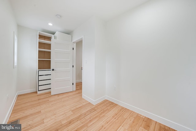 1621 Lyman Pl NE, Washington, DC 20002 - unfurnished bedroom with wood finished floors, baseboards, and recessed lighting
