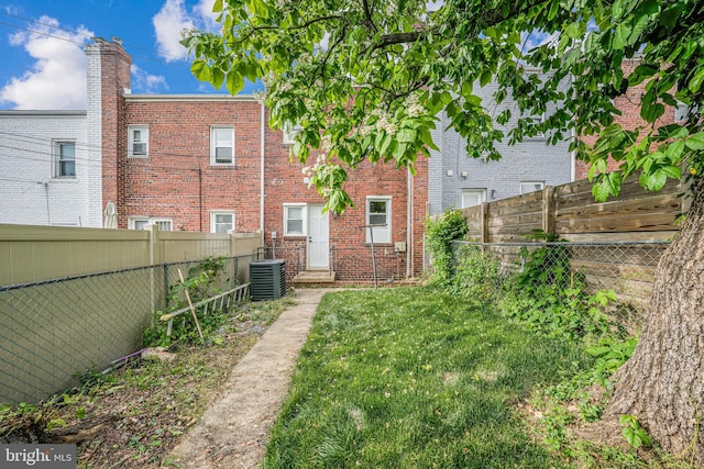 1621 Lyman Pl NE, Washington, DC 20002 - rear view of house featuring cooling unit and brick siding