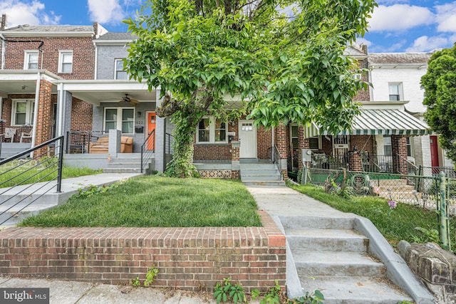 1621 Lyman Pl NE, Washington, DC 20002 - view of property featuring brick siding, a porch, and a ceiling fan