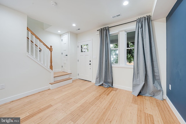 1621 Lyman Pl NE, Washington, DC 20002 - foyer entrance with wood finished floors, baseboards, stairs, and recessed lighting