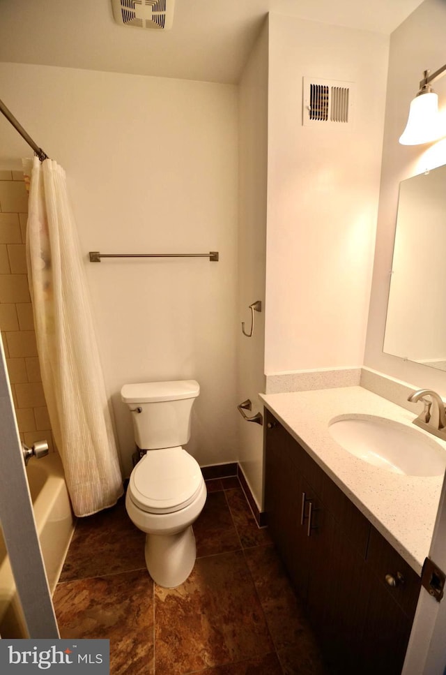 bathroom featuring toilet, visible vents, shower / bath combo with shower curtain, and vanity